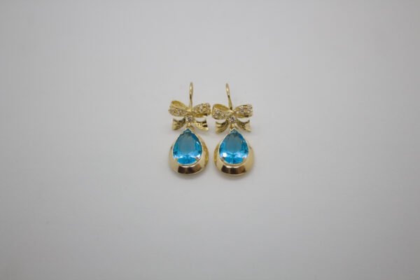 OLA-043-A_1 Aretes Moño Mágico de Color